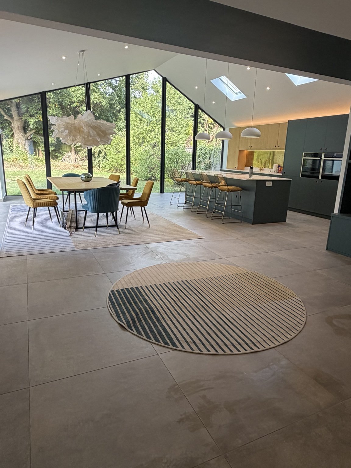 Finished kitchen and dining area with crisp white ceilings