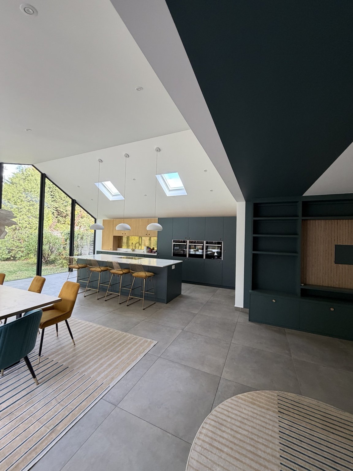 Wide view of the decorated open-plan kitchen and dining space