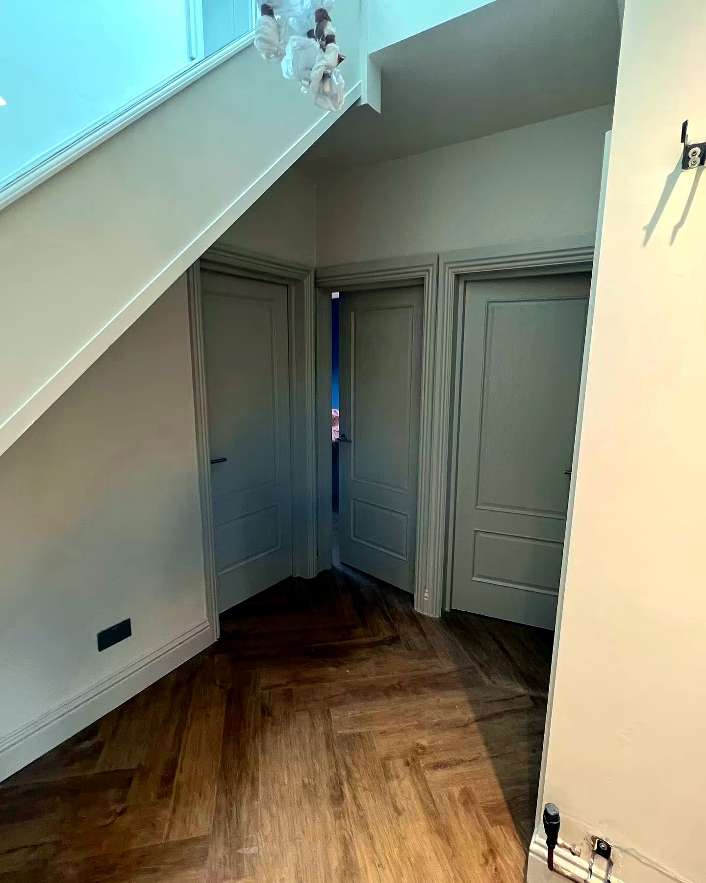 Freshly decorated hallway with parquet floor