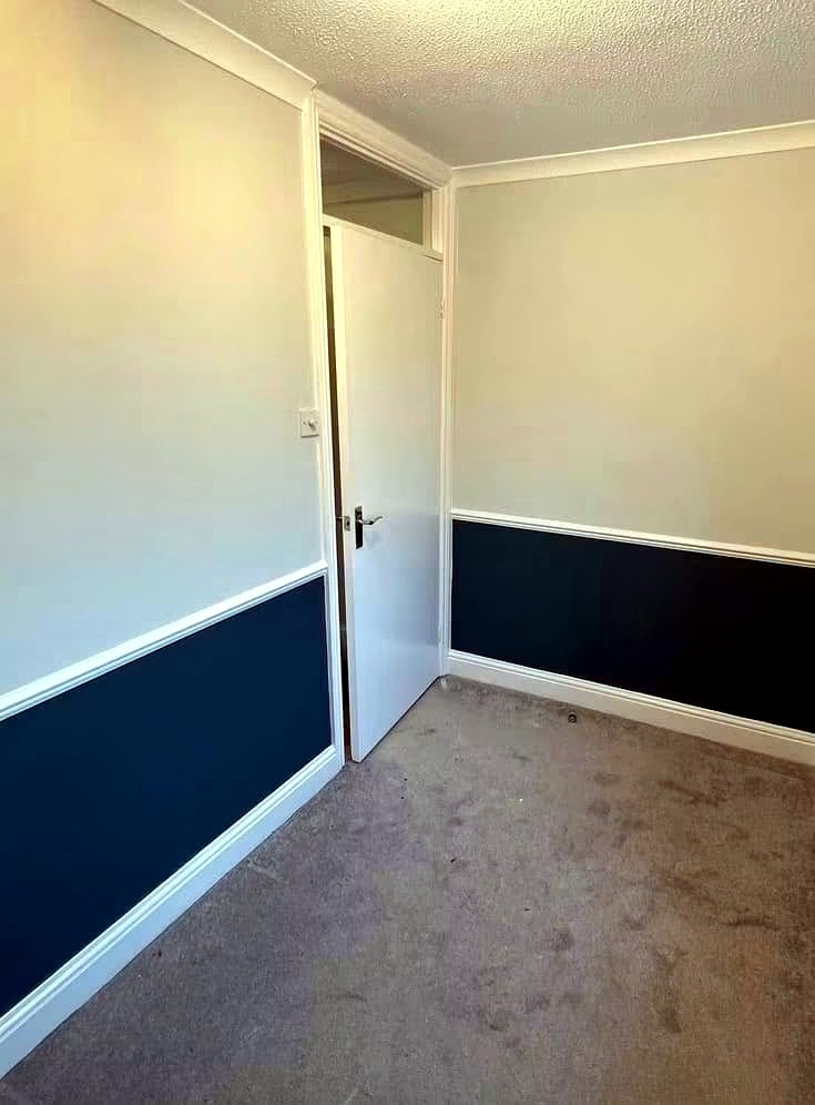 Two-tone grey interior with crisp white dado and woodwork