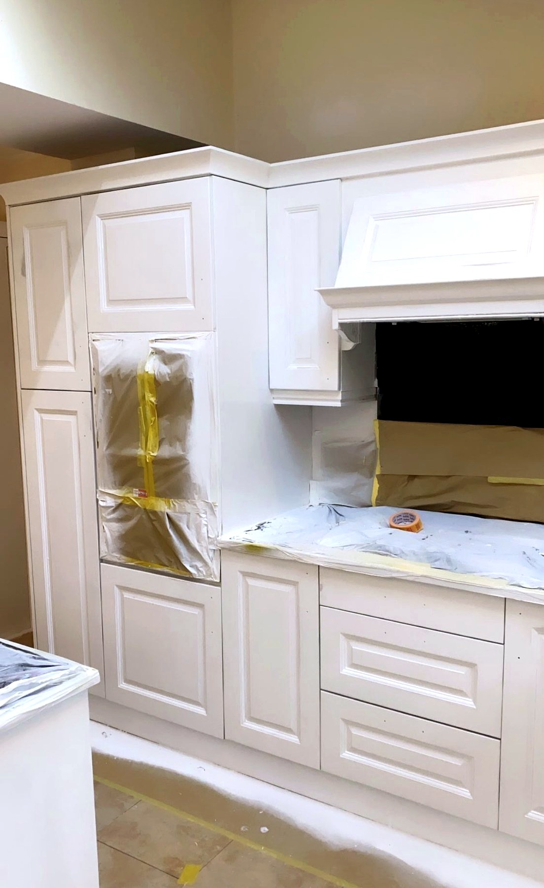 Finished sprayed white kitchen cabinetry