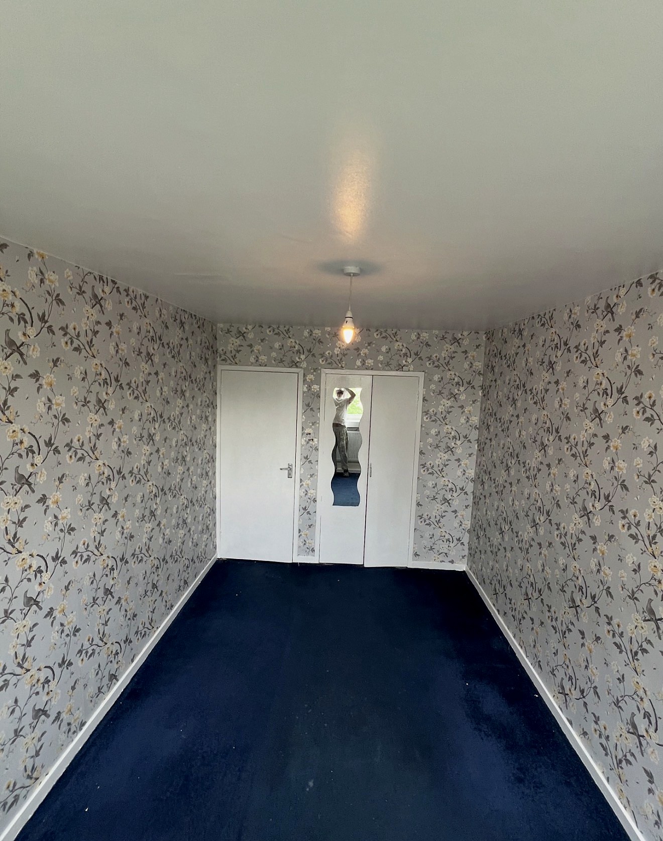 Floral wallpapered room