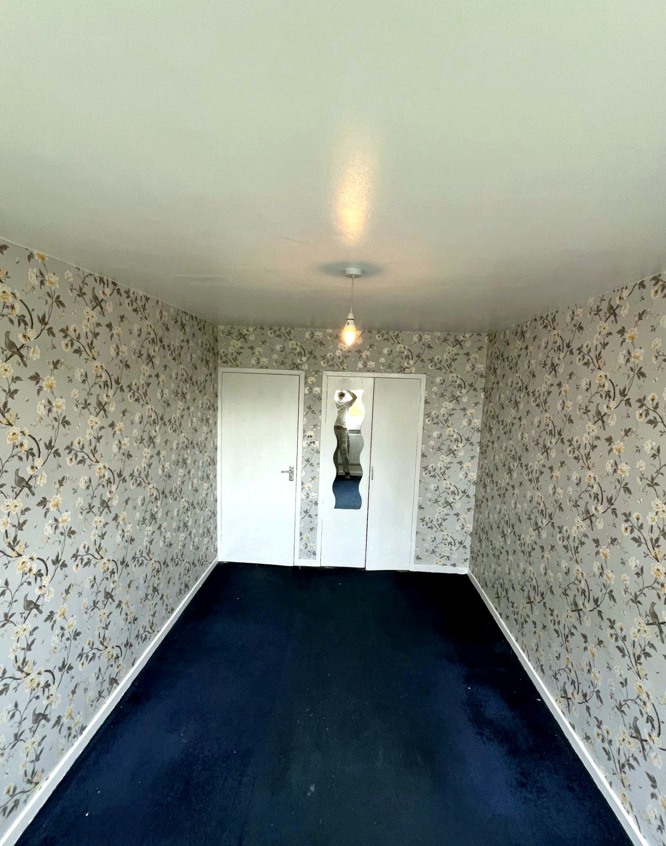 Floral wallpapered room