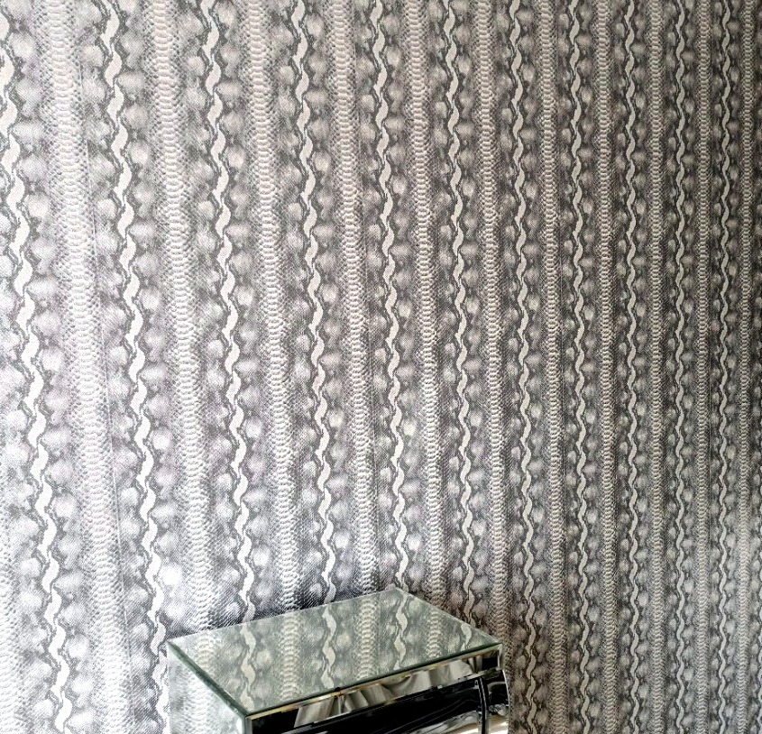 Close-up of professionally hung patterned wallpaper