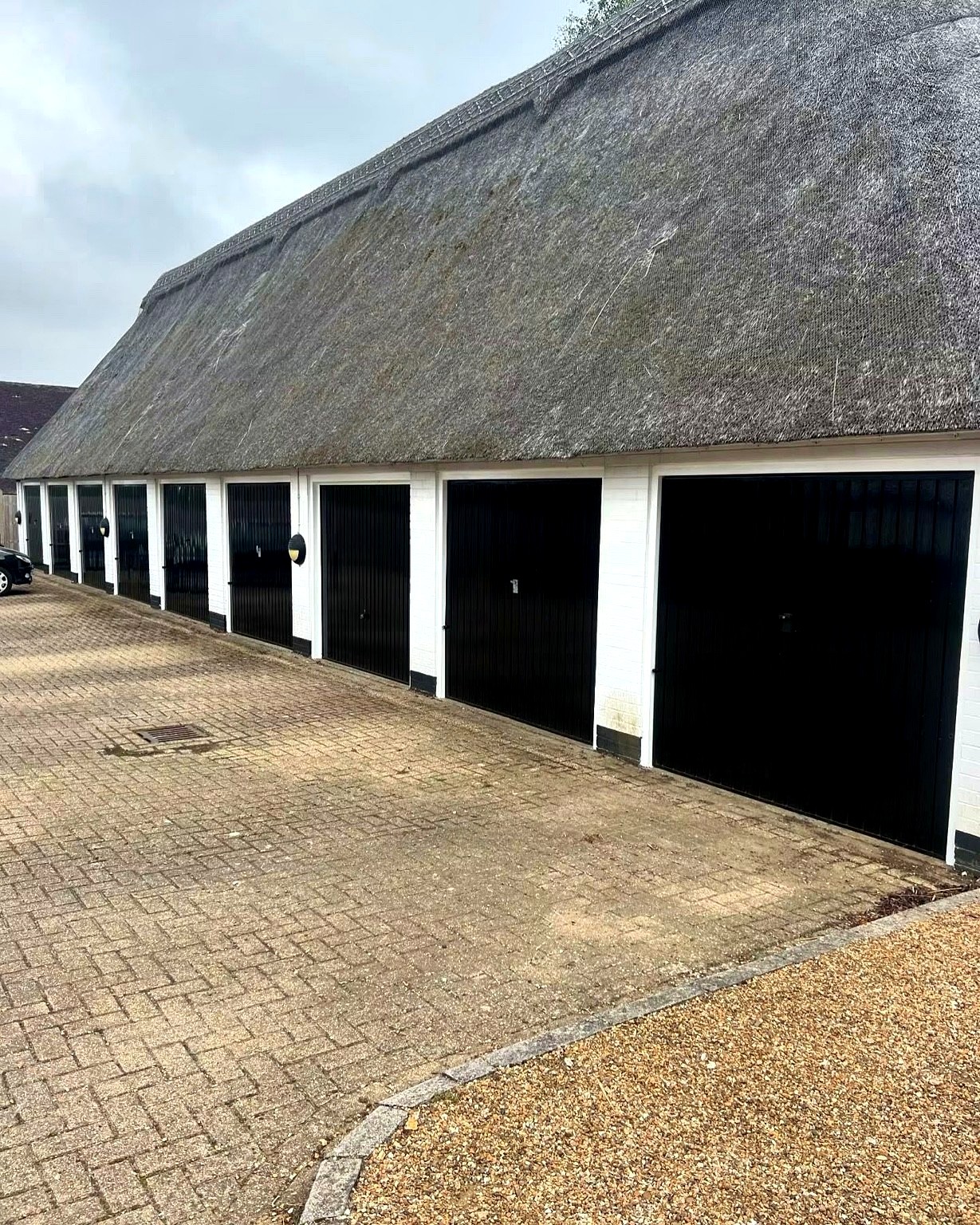 Thatched property exterior project photo